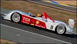 2006 June AUDI R10 race car wins the 24hrs LeMans (France) endurance race. The R10 is powered by a V12, 5.5l twin turbo, Diesel engine with common rail injection (1600bars) which develops 485kW.