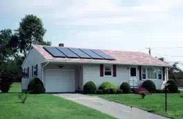 Description: Description: Image of a solar photovoltaic system on the roof of a house.