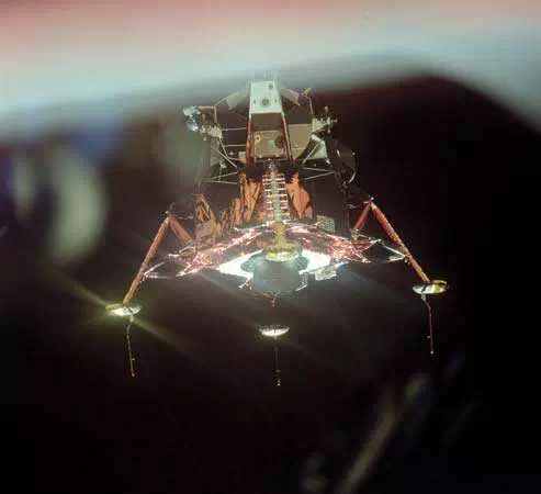 Apollo 11 lunar module Eagle with its four landing-gear footpads deployed. This photograph was taken from the command module Columbia as the two spacecraft moved apart above the Moon.