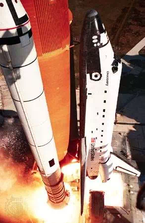 U.S. space shuttle orbiter Discovery lifting off from the Kennedy Space Center in Florida on its third mission, January 24, 1985. Also visible in the image are its attached external tank (orange) and one of its two solid-fuel boosters. Discovery  was one of five operational shuttle orbiters built by Rockwell International's North American division.