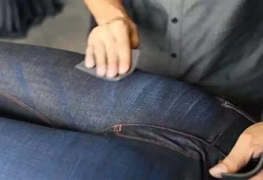 Hand Scraping of denim